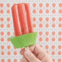 Use a paper cupcake liner to keep popsicle drips contained