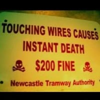 TOUCHING
WIRES CAUSES INSTANT DEATH. $200 FINE. Newcastle Tramway Authority