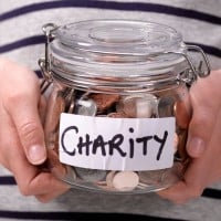 By donating to charities