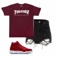 A Thrasher t-shirt, ripped shorts and a pair of Air Jordans