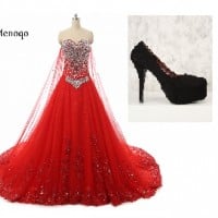 A red gown and black heels